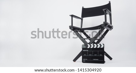 Black Clapper board or movie slate with director chair use in video production or movie and cinema industry. It's put on white background.
. Royalty-Free Stock Photo #1415304920