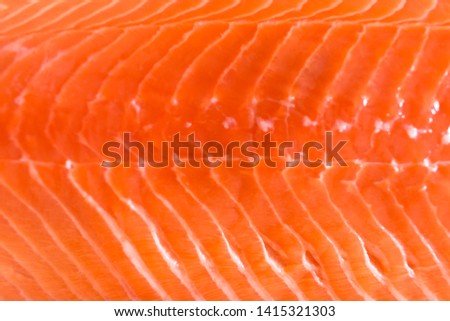 
Fillet of raw salmon and on the table.