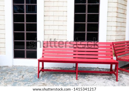 Red bench in retro style resort.