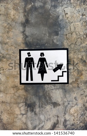Label of man and women with arrow showing  upstairs
