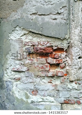 Old painted damaged concrete wall. Texture. Abstract background. Colorful pattern.