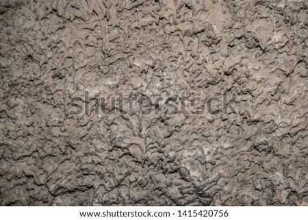 Texture of rough plaster. Background image. Old wall. Untreated surface.