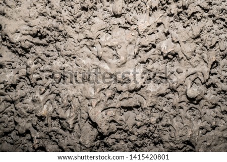 Texture of rough plaster. Background image. Old wall. Untreated surface.