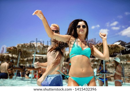 Group of friends having fun on summer vacation. Lifestyle, friendship, travel and holidays concept