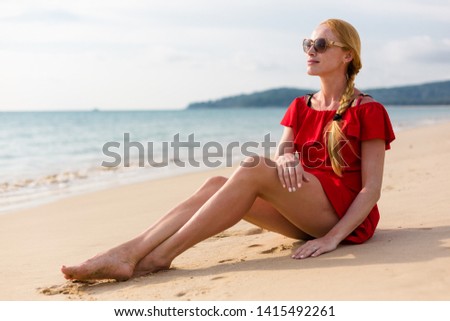 Blonde model on the beach in Thailand