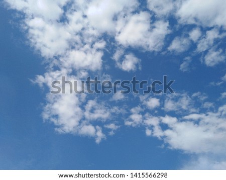 White clouds and blue skies or beautiful bright sky background