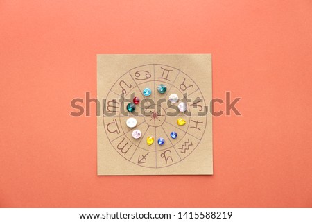 Astrological horoscope with birthstones on color background Royalty-Free Stock Photo #1415588219