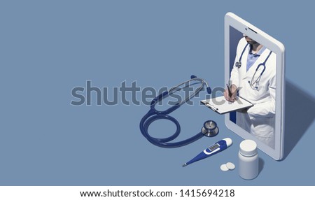 Professional doctor in a smartphone giving a consultation online, he is writing medical records and giving a prescription, telemedicine and healthcare concept, blank copy space Royalty-Free Stock Photo #1415694218