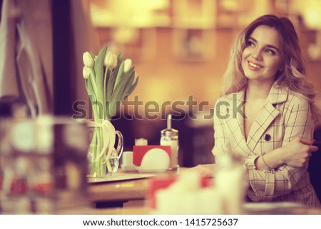 spring flowers bouquet / beautiful girl with spring flowers of white tulips, happiness, wedding, holiday
