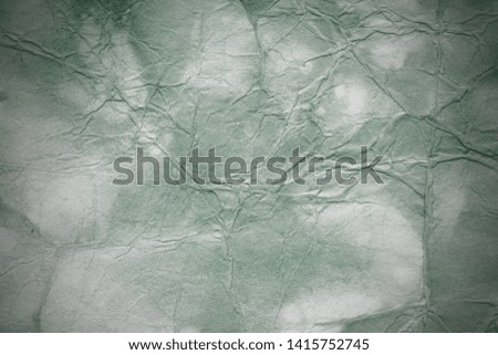 Old background with dust and dirty stains. Blank aged paper sheet. Vintage and antique art concept. Texture like cardboard, stone, concrete or natural marble. Poster mockup. Сloseup studio shot. Toned
