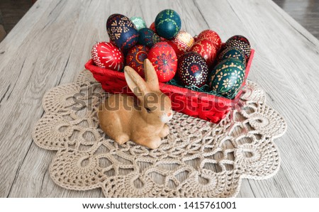 Decorated easter eggs on table.