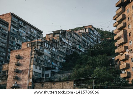 Building apartments in a suburban town built on a steep hill