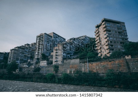 Building apartments in a suburban town built on a steep hill