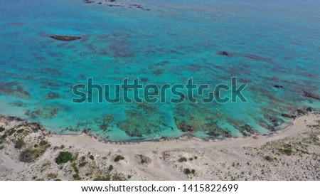 Aerial drone panoramic view photo of famous paradise sandy deep turquoise beach of Elafonisi in South West Crete island, Greece