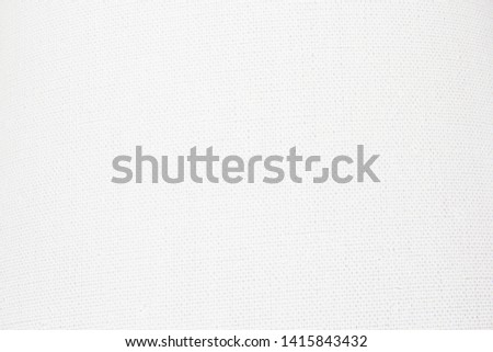 Canvas rolled up on white background