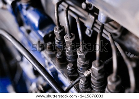 Mechanic opened the locking valve mechanism. Disassemble engine block vehicle. Old motor capital repair. Car service concept.