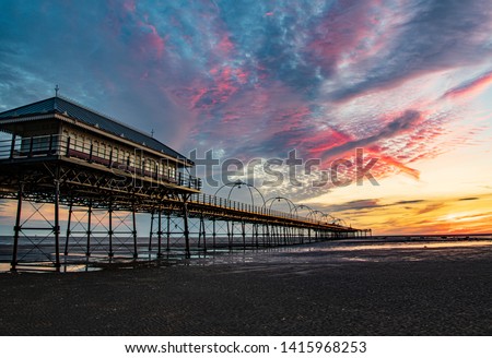 Sunset Over Southport Pier and Beach Merseyside UK Royalty-Free Stock Photo #1415968253