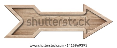 Wooden arrow shape signpost made of natural wood with bright fra