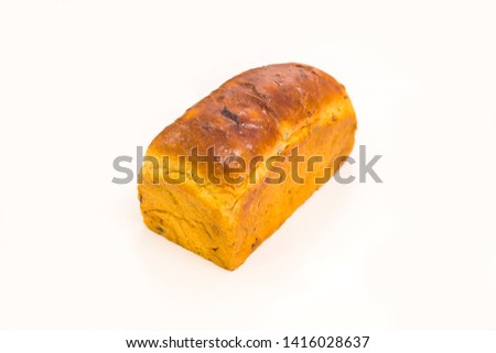 Plain bread with raisins on white background