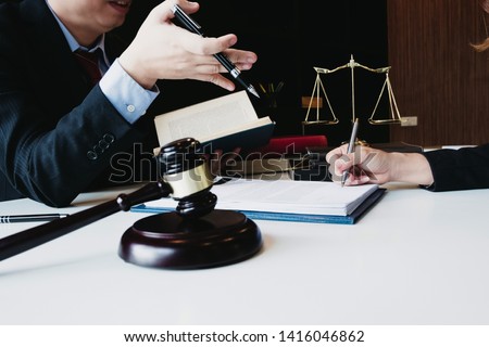 smart lawyer review and give advice to clients in the office before considering the judgment, lawyer concept
