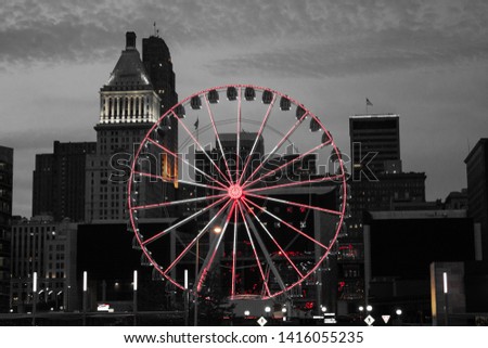 Cincinnati skyline and ferris wheel with B&W color pop effect.