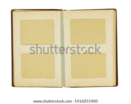 Old uncovered photo album with red cover isolated on white background. Flat lay The view from the top.