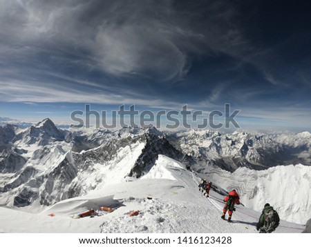 mountaineers climbing the Mount Everest