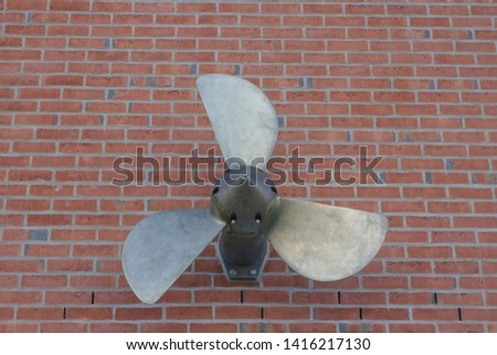 Art objects on a brick wall