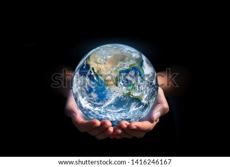 earth in hands. green planet on hand. save of earth. environment concept for background web or world guardian organization.Elements of this image furnished by NASA Royalty-Free Stock Photo #1416246167