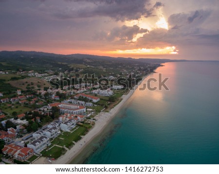 Aerial photo of Chaniotis village coastline during sunset, Kassandra peninsula of Chalkidiki