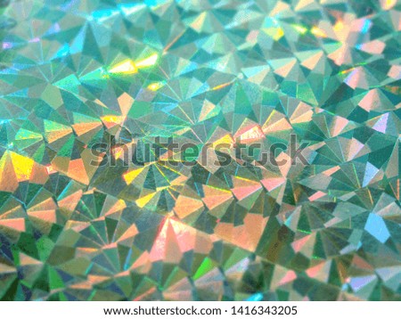 Holographic colorful green lights festive background. Abstract geometric pattern backdrop. Design for your ad, poster, banner