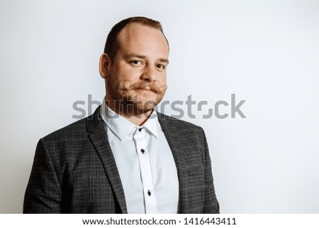 Happy businessman isolated - handsome man standing