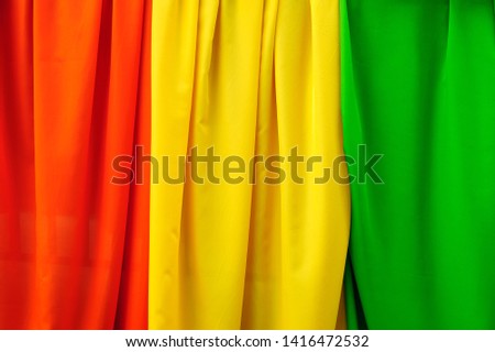 Creative layout made of colorful smooth elegant fabric texture background. Background concept. Top view. Flat lay. Horizon concept. Decorate concept. Macro concept. Close up with copy space.