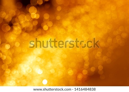 Abstract gold bokeh circles , bokeh abstract Christmas and new year theme background, Gold defocused light,