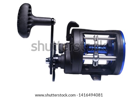 reel for sea fishing white background.
