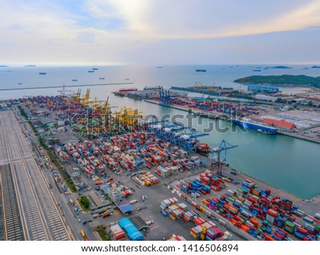 Aerial top view of container cargo ship in the export and import business and logistics international goods in urban city. Shipping to the harbor by crane in Laem Chabang, Chon Buri, Thailand Royalty-Free Stock Photo #1416506894