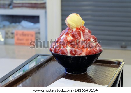 Strawberry Bingsu/Bingsoo, A Korean shaved ice dessert with Fresh Strawberry and Vanilla ice cream. (isolated)