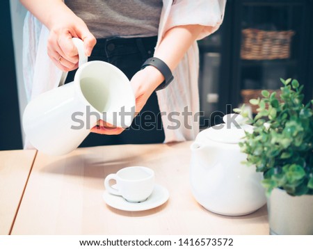 woman power with owner business and hobby lifestyle concept from beauty hand hold white jar and cup for serve coffee or hot drink in restaurant with copy space