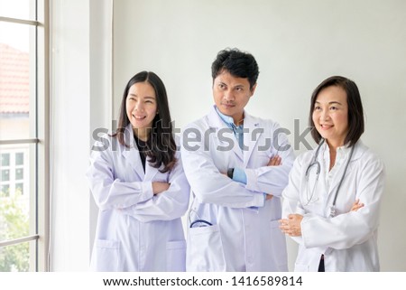 Three asian medical workers. Portrait of asian doctor. Chemists doing in the laboratory. young scientists with test and research in clinical laboratory. Doctor with stethoscope for patient examination