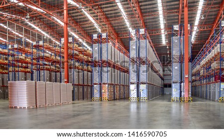 Warehouse distribution center, cargo on shield inside warehouse. Royalty-Free Stock Photo #1416590705