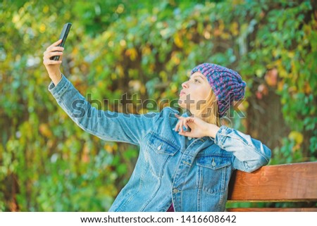 Woman having mobile conversation. Mobile communication and social networks. Girl call friend. Stay touch with modern smartphone. Mobile call concept. Girl with smartphone green nature background.