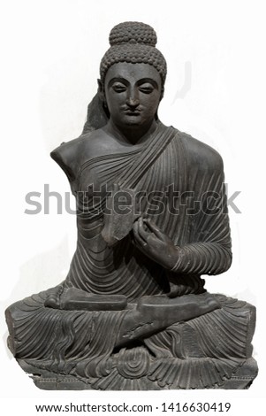 Archaeological sculpture of Preaching Buddha. Circa fourth century of the Common Era, Sahri Bahlol