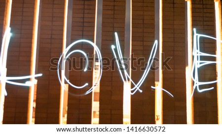 LOVE spelled in the air at night, this is one picture, not photoshopped