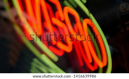 Open neon sign with reflection - Glowing LED Open sign.