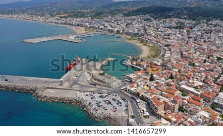 Aerial drone panoramic photo of unique and picturesque Venetian port with old lighthouse in the heart of famous city of Rethymno, Crete island, Greece