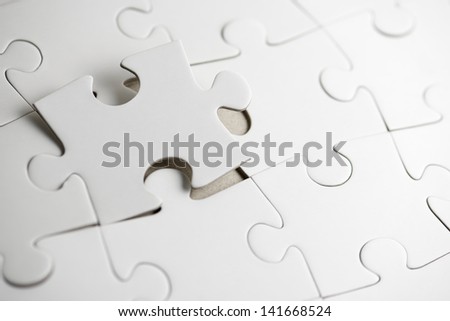 close up of the pieces of a puzzle Royalty-Free Stock Photo #141668524