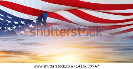 American flag in a bright sky