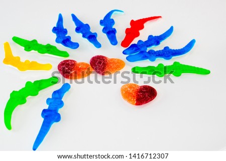 candy from the marmalade in the form of crocodiles of different colors 