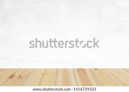 Empty Wood Plate Top Table On Concrete Textured Background

