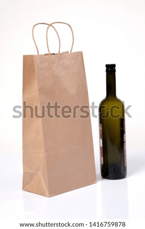 Natural organic package wrapping papers wine package bags Concept photo shot on white background.